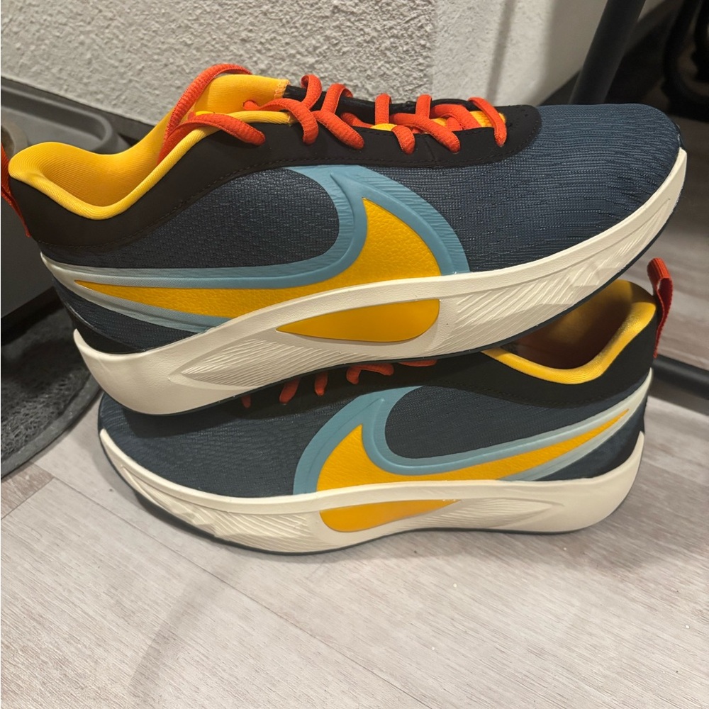 Kyrie Irving Nike Black and Yellow Athletic Shoes